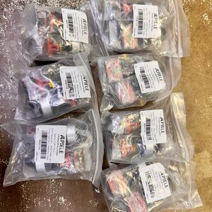 Seven pack of two pairs of 2 position selector switches